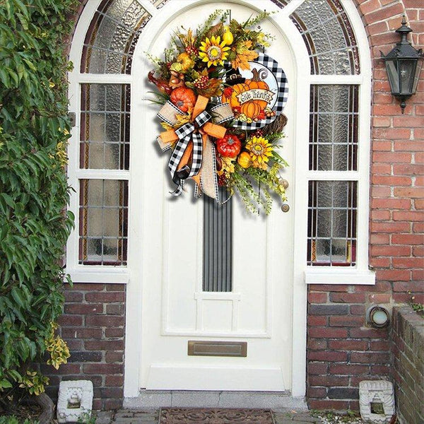 Couronne de citrouilles et de tournesols en treillis de buffle de la ferme